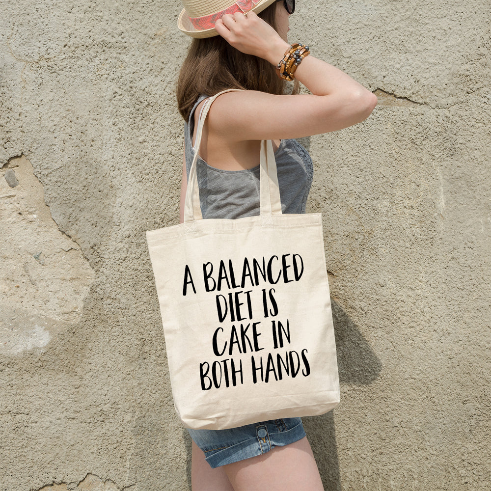 A balanced diet is cake in both hands | 100% Cotton tote bag - Adnil Creations